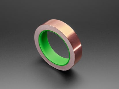 Angled Shot of the Copper Foil Tape with Conductive Adhesive - 25mm x 15 meter roll.