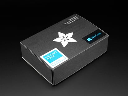 Angled shot of a black box with the white Adafruit star-flower logo.