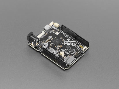 Angled shot of black, credit card-sized microcontroller.